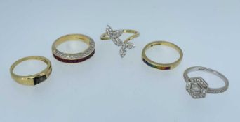 FIVE 18K GOLD RINGS comprising two diamond set rings, diamond and ruby ring, multi-gem ring and