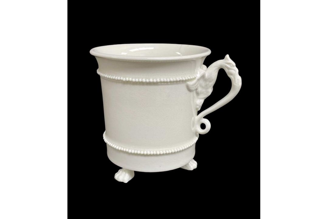 BELEIVED SWANSEA PORCELAIN CABINET CUP circa 1815-1817, raised over three claw feet and with gryphon - Image 1 of 2