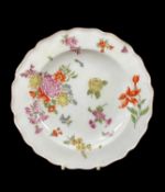 CHELSEA RED ANCHOR PORCELAIN PLATE, c. 1756-58, with lobed rim, decorated with sprays and sprigs