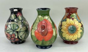 THREE MODERN WILLIAM MOORCROFT TUBELINE DECORATED OVOID VASES, sunflowers with impressed mark to