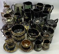 JACKFIELD WARE - a collection of late 19th century jugs, teapots and bowls