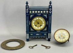 ARTS & CRAFTS MANTEL CLOCK in painted case with carved detail, circular cream and gilt dial with