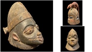 THREE YORUBA GELEDE & EGUNGUN HELMET MASKS, tallest 38cm h (3)
