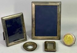 SILVER HALLMARKED PHOTOGRAPH FRAMES (5) - to include three with easel stand backs, 21 x 15.75cms, 16