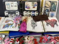 FOLDER CONTAINING QUANTIY OF FIRST DAY COVERS & STAMPS, toy dolls and albums of tattoo designs