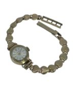 9CT GOLD LADIES AVIA WRISTWATCH, having 9ct gold integrated heart bracelet, 10.8gms Provenance: