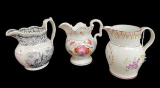 THREE WELSH ANTIQUE POTTERY DOCUMENTARY JUGS comprising (1) footed jug with curvaceous rim,