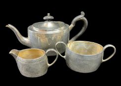 VICTORIAN SILVER MATCHED THREE PIECE TEASET comprising teapot, sucrier and jug, oval shape, engraved