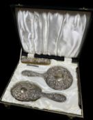 CASED SILVER DRESSING TABLE VANITY SET comprising mirror, two brushes, bitton hook, nail file ETC,