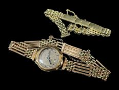 14K GOLD VULCAN LADIES WRISTWATCH, having yellow metal brickwork bracelet, together with 14k gold