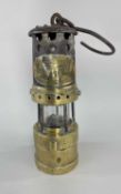 THOMAS & WILLIAMS 'MIDGET' MINER'S LAMP, with oval name plate (damaged) 20cm h