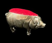 NOVELTY SILVER 'PIG' PIN CUSHION, M. Bros., assayed Birmingham c. 1900, 6.4cm long Comments: