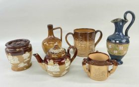 SIX DOULTON STONEWARE VESSELS, comprising Doulton Lambeth small harvestware teapot, small tyg, large