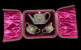 CASED VICTORIAN SILVER BACHELOR'S TEA SET, Horace Woodward & Co, London 1889, comprising teapot,