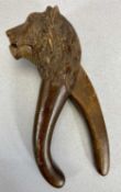 VICTORIAN BLACK FOREST NUTCRACKERS, A PAIR - carved as a lion's head with detail features, inset