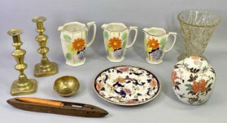 ARTHUR WOOD GRADUATED SET OF 3 OCTAGONAL JUGS - brightly coloured floral decoration, 18cms