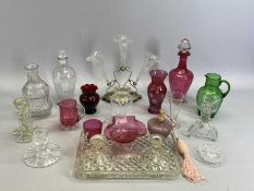 CRANBERRY GLASS DECANTER - of circular tapered form with clear glass foot and stopper, 27cms H,