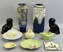 ROYAL DOULTON STONEWARE VASE - incised decoration of roses, on a mottled blue ground, 37cms H,