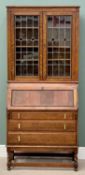 VINTAGE OAK BUREAU BOOKCASE - the upper section having twin leaded glazed doors with Arts & Crafts