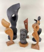 JOHN EXCELL WOOD SCULPTURES, abstract and semi-abstract figural forms, and a head sculpture of St.