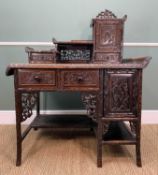 CHINESE CARVED HARDWOOD WRITING DESK, c. 1900, asymmetric form with carved simulated bamboo frame,