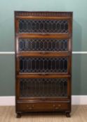 GUMM STAINED OAK SECTIONAL BOOKCASE, foliate carved frieze above four up-and-over leaded glass