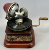 A GERMAN NIRONA '888' TIN PLATE WIND UP CHILD'S GRAMOPHONE PLAYER - the red enamelled base having
