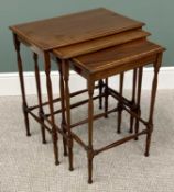 CIRCA 1900 MAHOGANY & SATINWOOD CROSSBANDED NEST OF THREE TABLES - having spider legs, 65cms H,