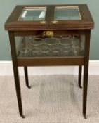 GOOD QUALITY METAMORPHIC DRINKS CABINET - having inset brass ring pull handles to the bevelled edged