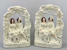 STAFFORDSHIRE FLATBACK GROUP - mid 19th century, man and woman seated beneath a grapes and vine leaf