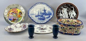 DUTCH POLYCHROME PLAQUE - Makkum, 19th century, of shaped oval form, Dutch scene with boats and
