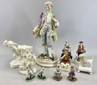 PORCELAIN FIGURINES, A PAIR - late 19th century, young man with bagpipes and lambs, young lady