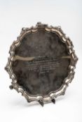 GEORGE V SILVER SALVER, Adie Bros., Birmingham, 1932, on three scrolled feet, engraved and dated