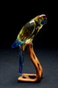 SWAROVSKI CRYSTAL GREEN ROSELLA JONQUIL PARAKEET, on carved wood perch with coloured glass and metal