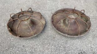 LARGE CIRCULAR PIG FEEDING TROUGHS - a pair, with wired sections, 32cms H, 78cms diameter