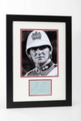 STANLEY BAKER AUTOGRAPH - together with black and white publicity photograph from Zulu, the