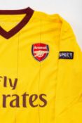 UNWORN 2010-11 CHAMPIONS LEAGUE ARSENAL FC AWAY LONG SLEEVE SHIRT, by Nike, size medium, in yellow