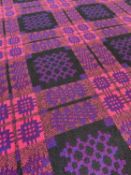 WELSH DERW WOOLEN TAPESTRY BLANKET, woven in pink, black, blue and claret, with fringe, 230 x