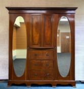 EDWARDIAN MAHOGANY WARDROBE COMPACTUM, dentil cornice above pair oval inlaid doors and three