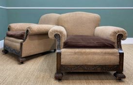 TWO STAINED BEECH EASY ARMCHAIRS, floral carved uprights, seat rail above tassel carved square feet,