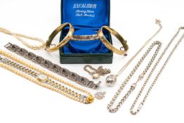 ASSORTED JEWELLERY comprising two rolled gold bangles, boxed Excalibur sterling silver bangle,
