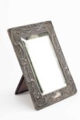 EDWARD VII SILVER EASEL MIRROR, of rectangular Art Nouveau design, Chester 1903 Provenance: