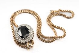 DARK SAPPHIRE & DIAMOND PENDANT AND 9CT GOLD CHAIN, chain stamped '375', sapphire 14mm x 11mm,