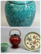 LIZZY WOOD HARROGATE - a Raku vase of baluster form, glazed in turquoise and reds, impressed mark to