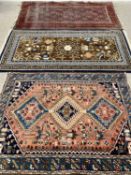 EASTERN STYLE RUGS (3) - to include a blue and brown ground Indian example with 