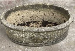 RE-CONSTITUTED STONE OVAL GARDEN PLANTER - with sunburst pattern in relief and end handles, 26cms H,