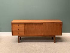 MID-CENTURY TEAK LONG SIDEBOARD - having twin easy slide cupboard doors with interior shelves and