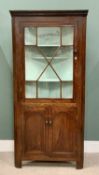 ANTIQUE OAK ONE-PIECE STANDING CORNER CUPBOARD, having an eight-pane astragal glazed upper door with