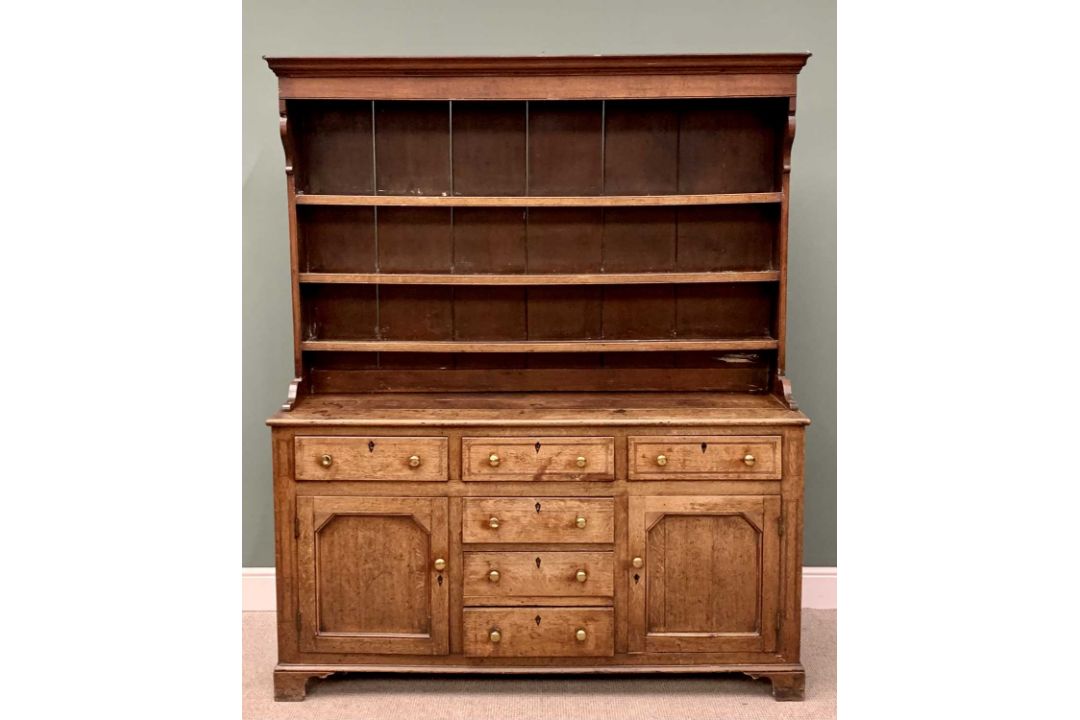 CIRCA 1830 OAK WELSH DRESSER, the three-shelf rack with wide backboards and shaped front detail over - Image 1 of 5