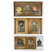 FIRE MARKS - a collection of seven pressed metal examples, Late 18th/Early 19th Century, Norwich